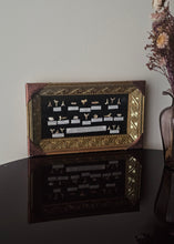 Load image into Gallery viewer, Quadro orizzontale con denti fossili di squalo
